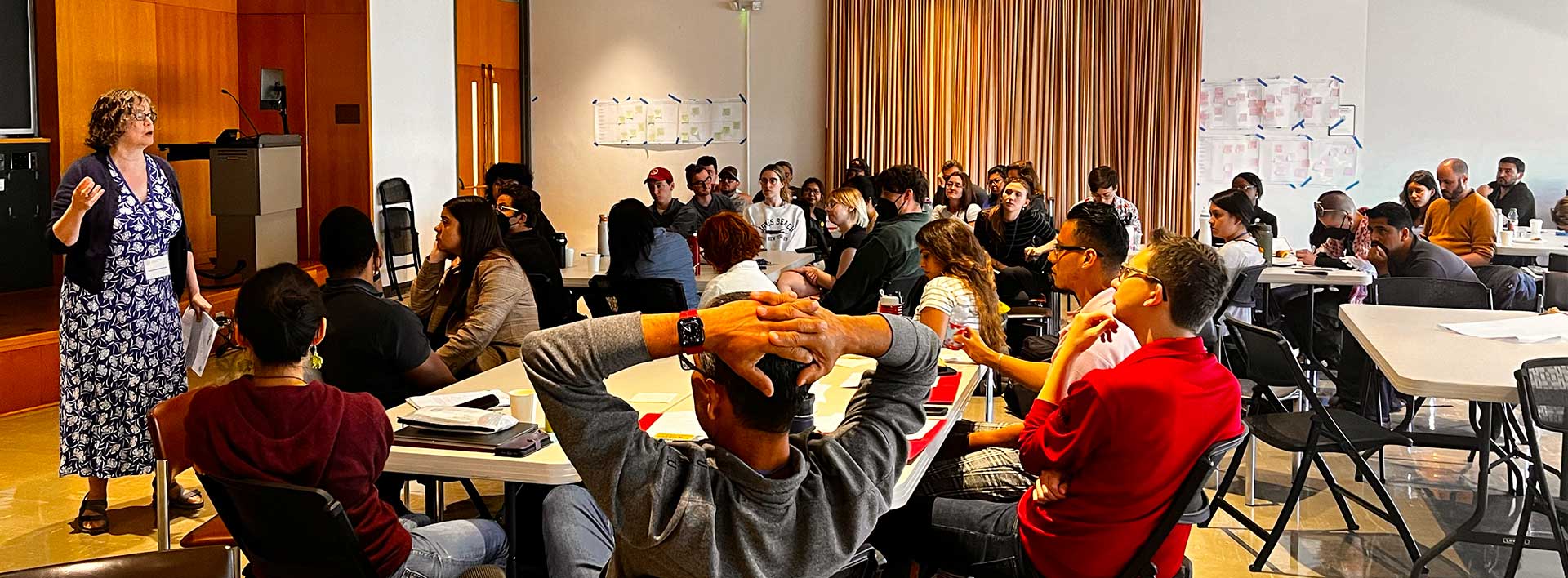 Strategic Corporate Research Summer School classroom with students and the instructor