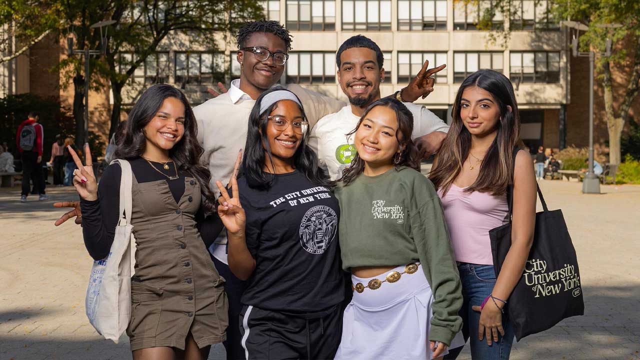 CUNY students gathered outdoors highlighting student community and campus life.