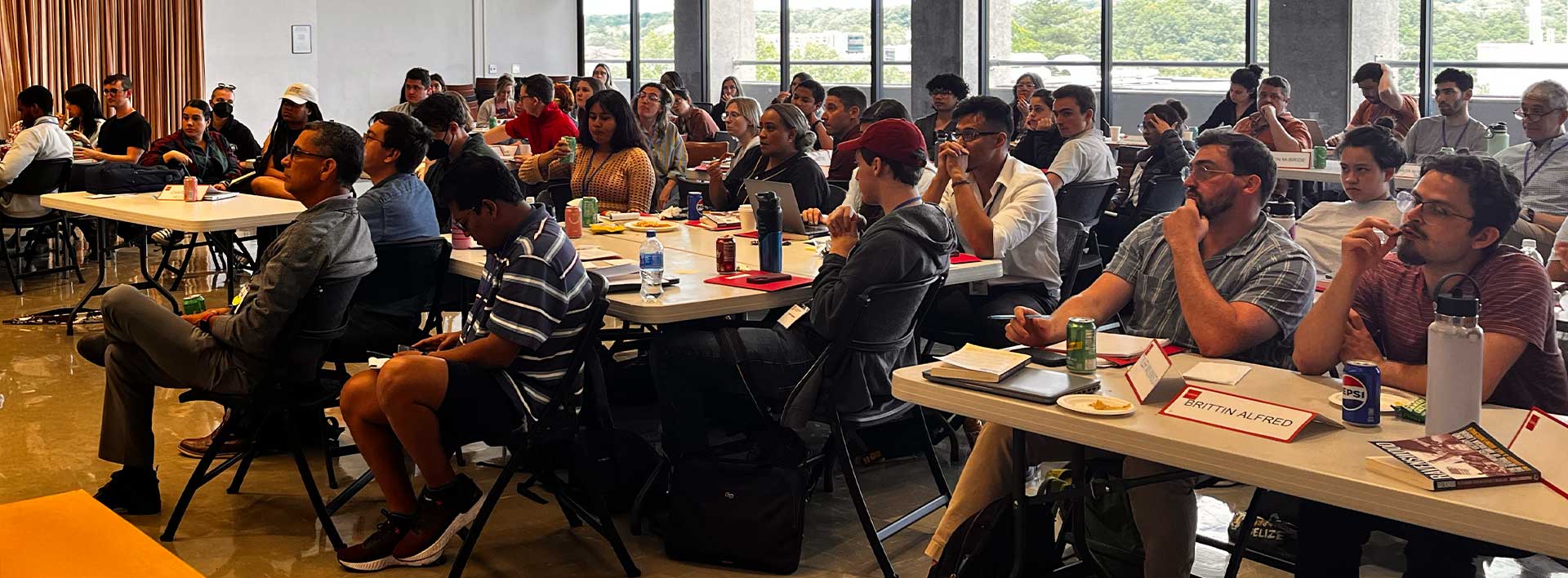 Students attend a large seminar session Strategic Corporate Research